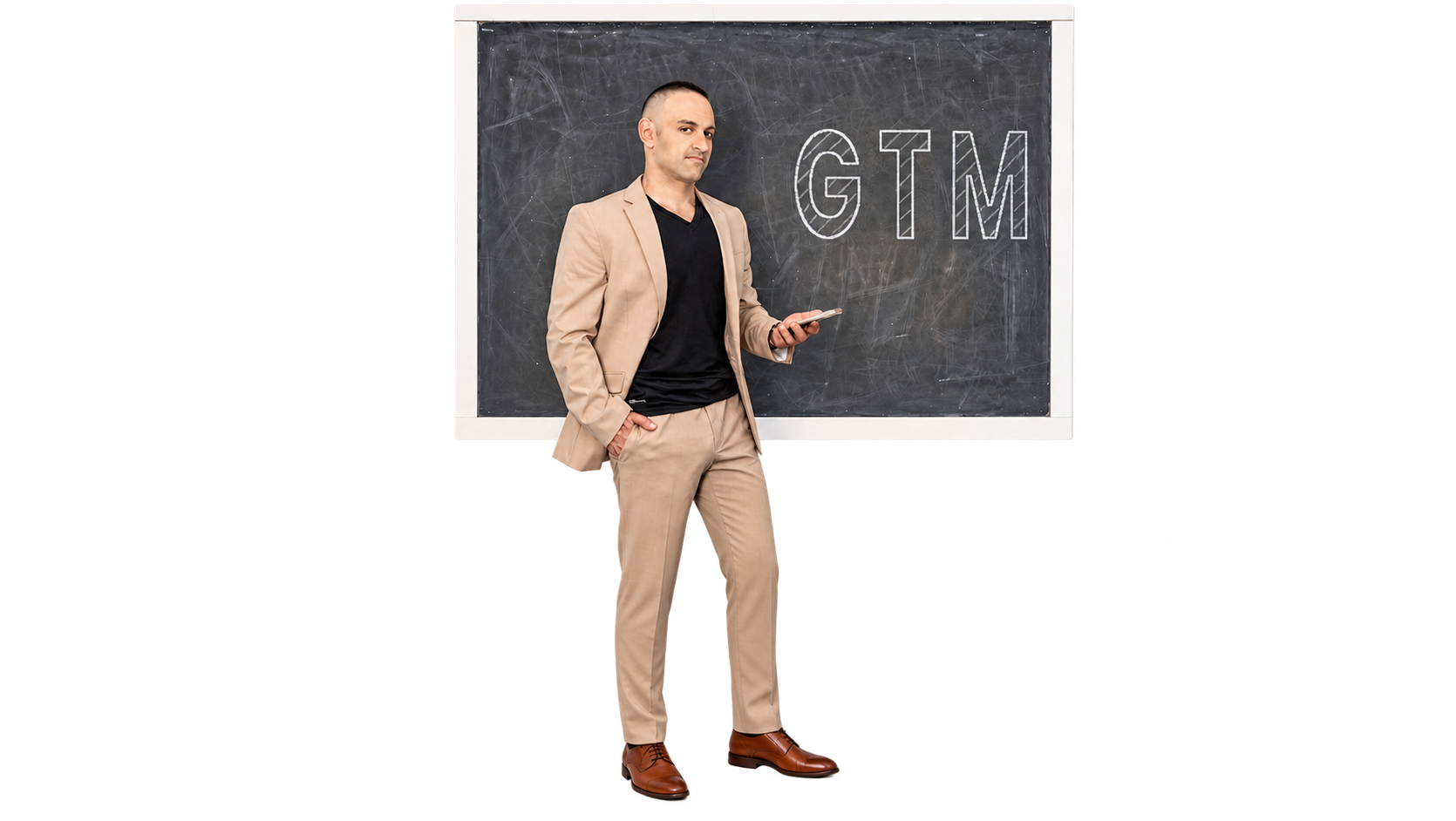 Alex Yarijanian in front of a blackboard with GTM written in chalk